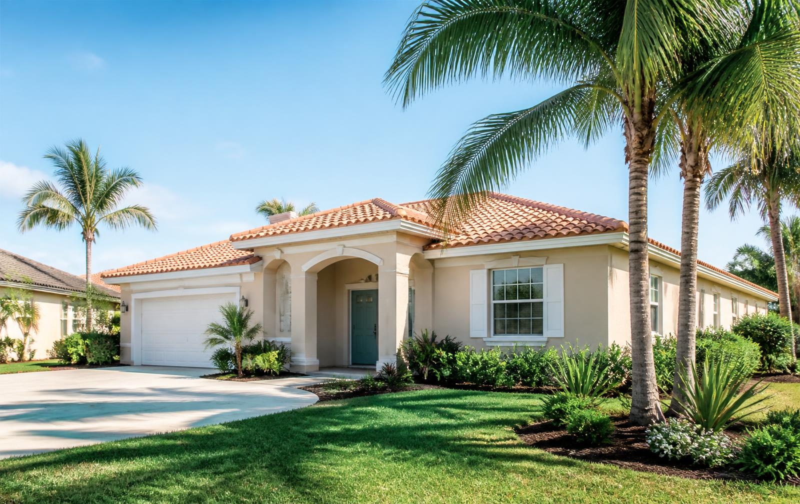 Single-family rental home in Florida with tile roof and mature landscaping